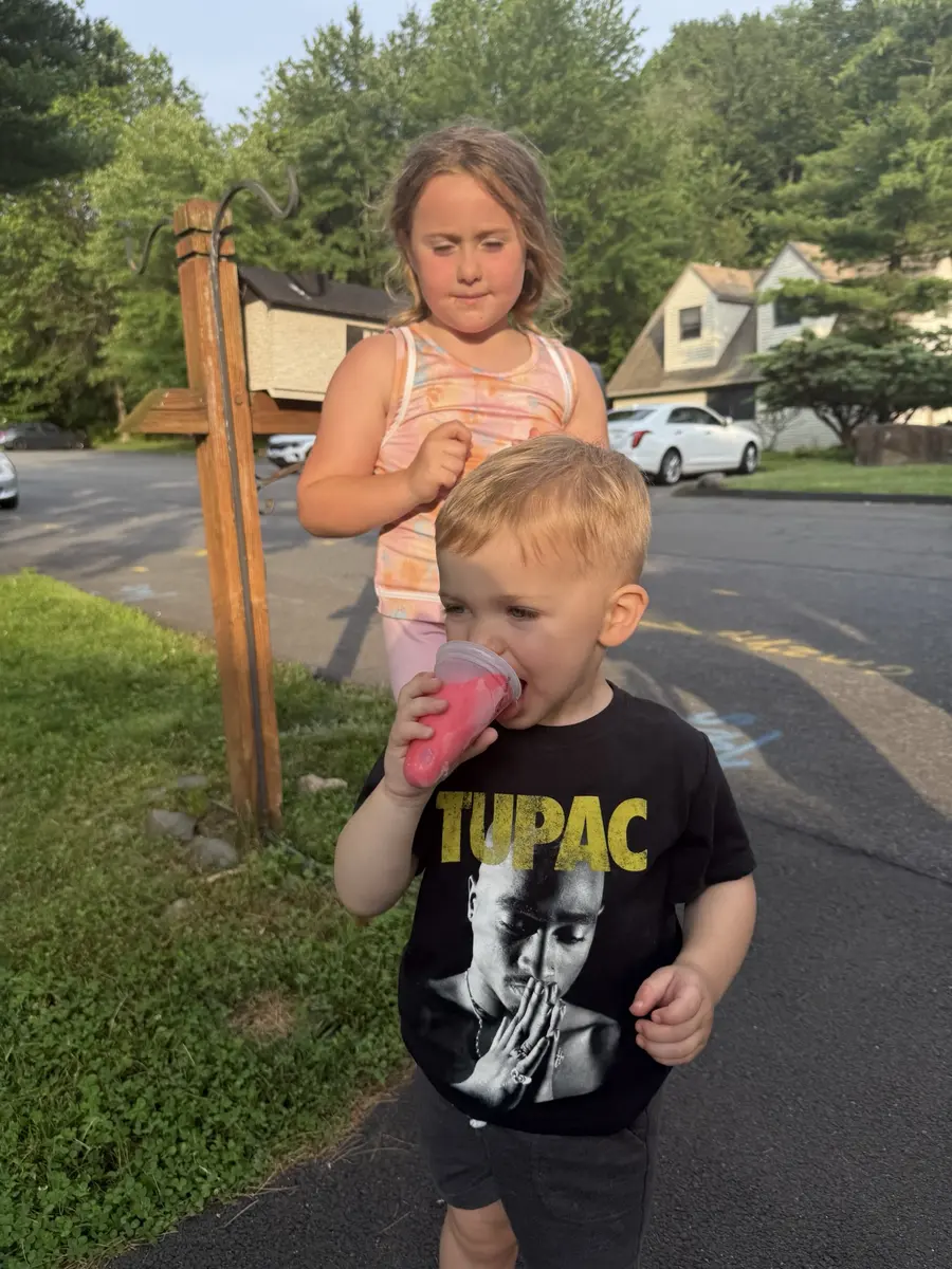Child enjoying a Frost Boss treat at a neighborhood stop